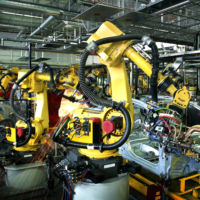 welding machines within a car production factory.